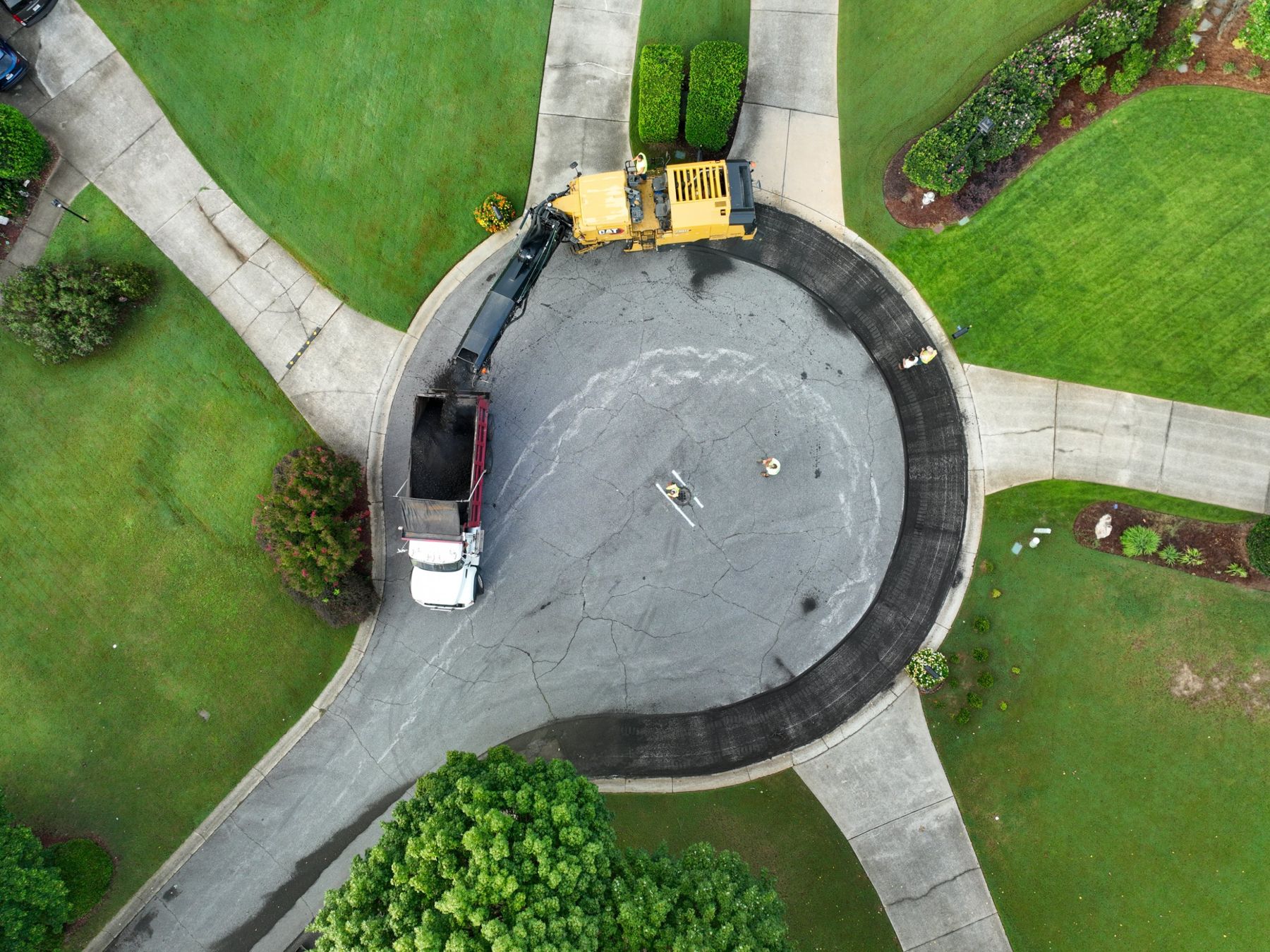 Overhead view of a milling crew resurfacing a cul-de-sac