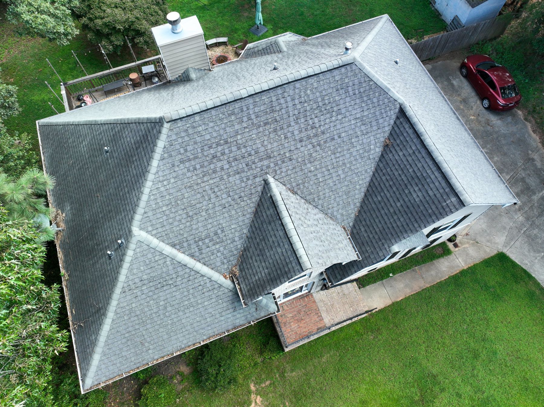 Overhead drone photo of a shingle roof